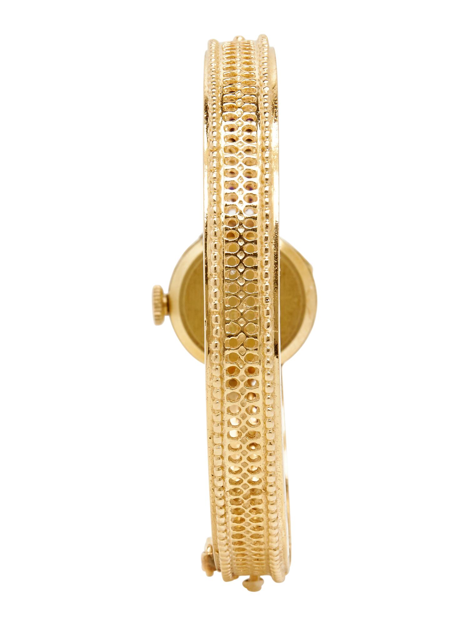 YELLOW GOLD AND ONYX WATCH AND RING