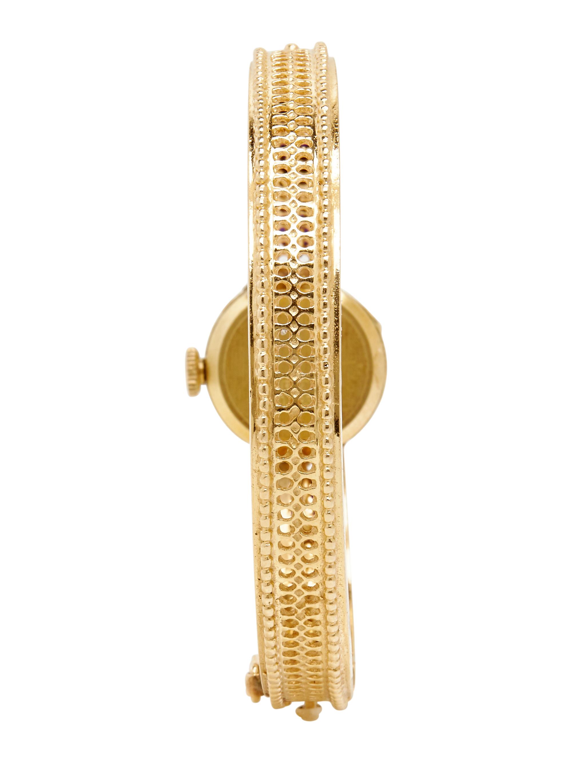 YELLOW GOLD AND ONYX WATCH AND RING
