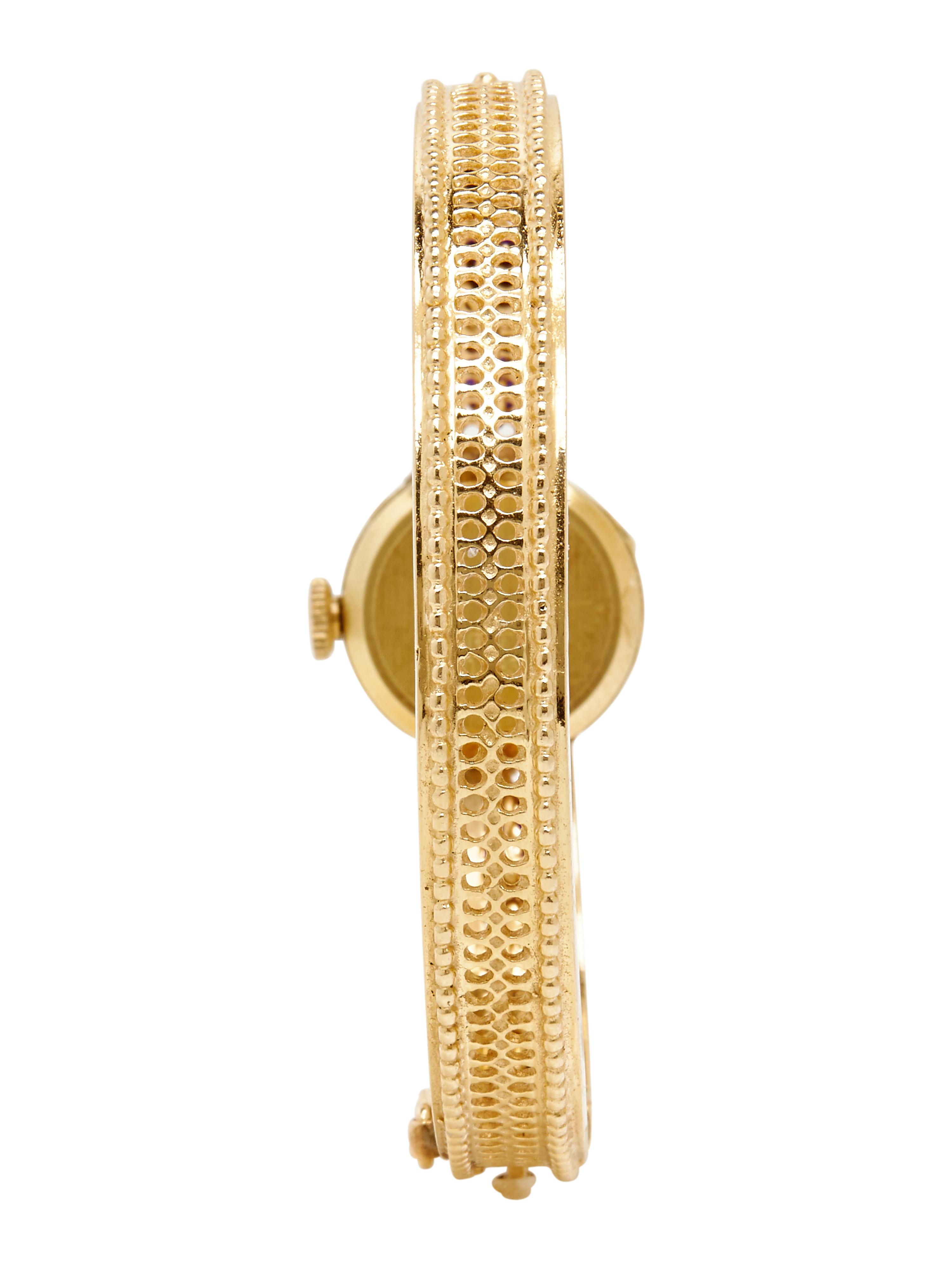 YELLOW GOLD AND ONYX WATCH AND RING
