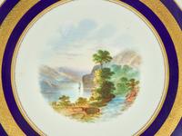 A Set of Nine Continental Gilt-Decorated Porcelain Cabinet Plates