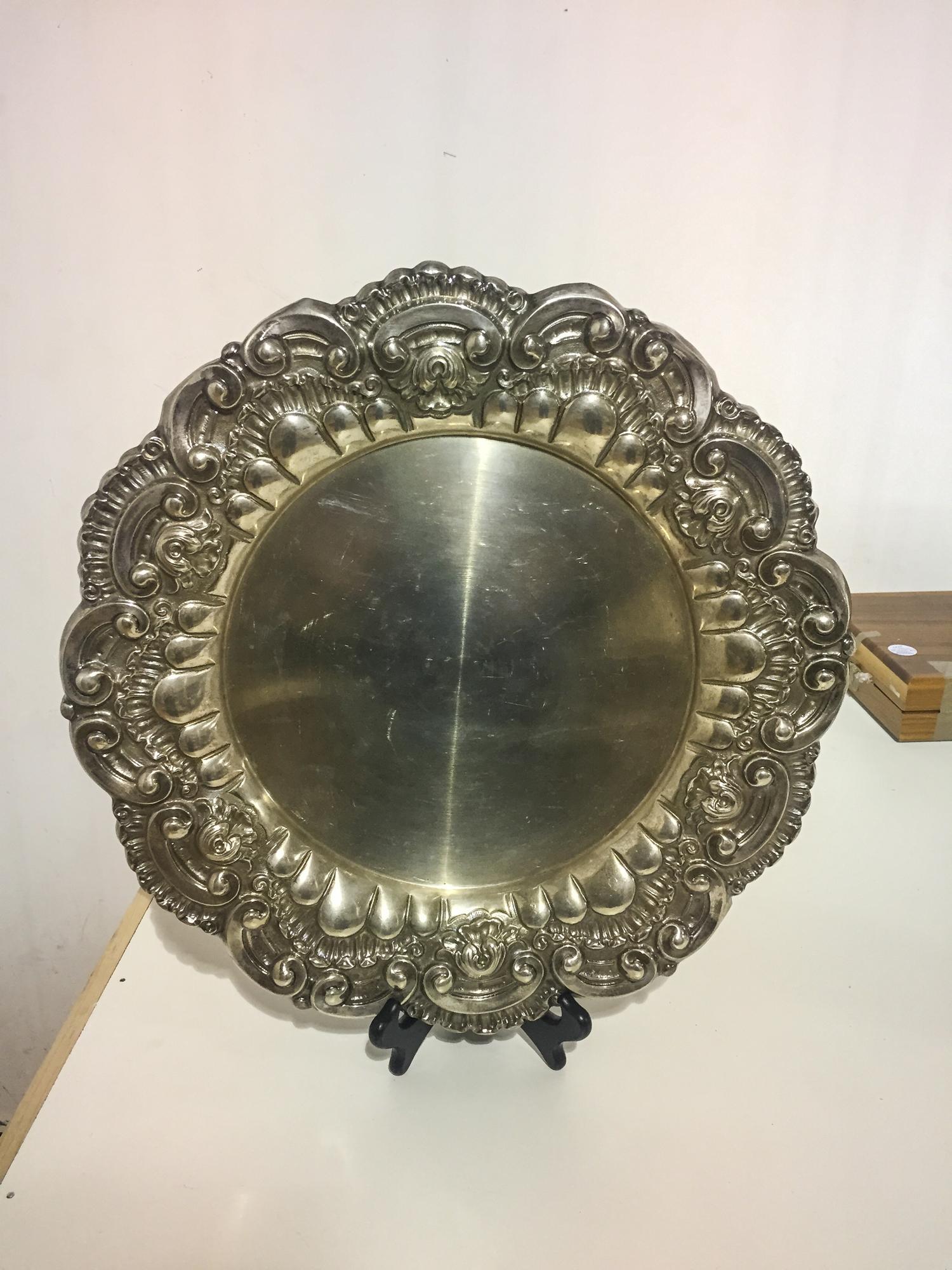 A Portuguese Silver Tray, Lisbon, Circa 1970, in the Baroque taste with a repousse border.
