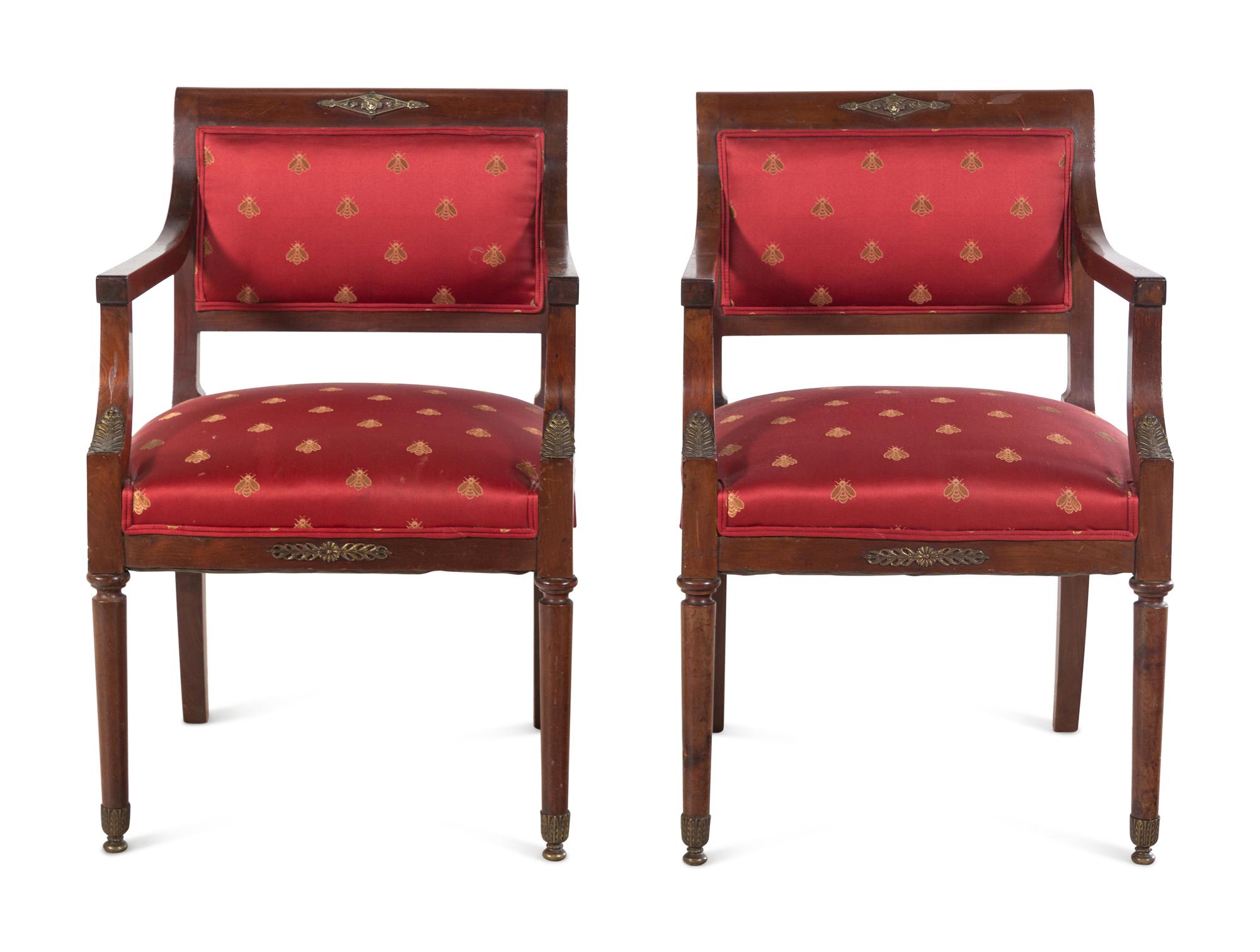 A Pair of Empire Style Gilt Metal Mounted Mahogany Armchairs