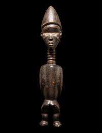 A Baule Wood Janus-Headed Figure