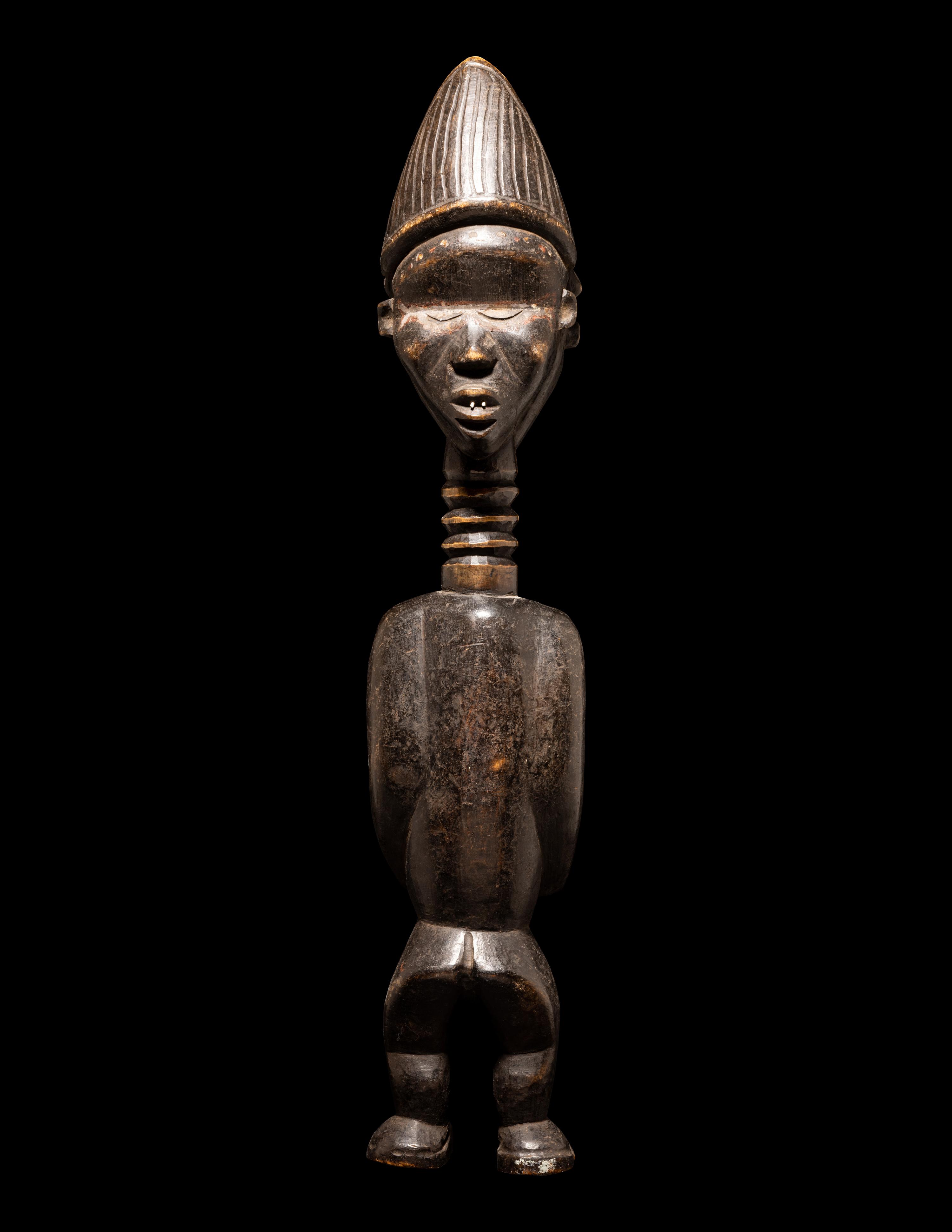 A Baule Wood Janus-Headed Figure