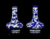 A Pair of Chinese Blue Overlay Opaque White Glass Bottle Vases