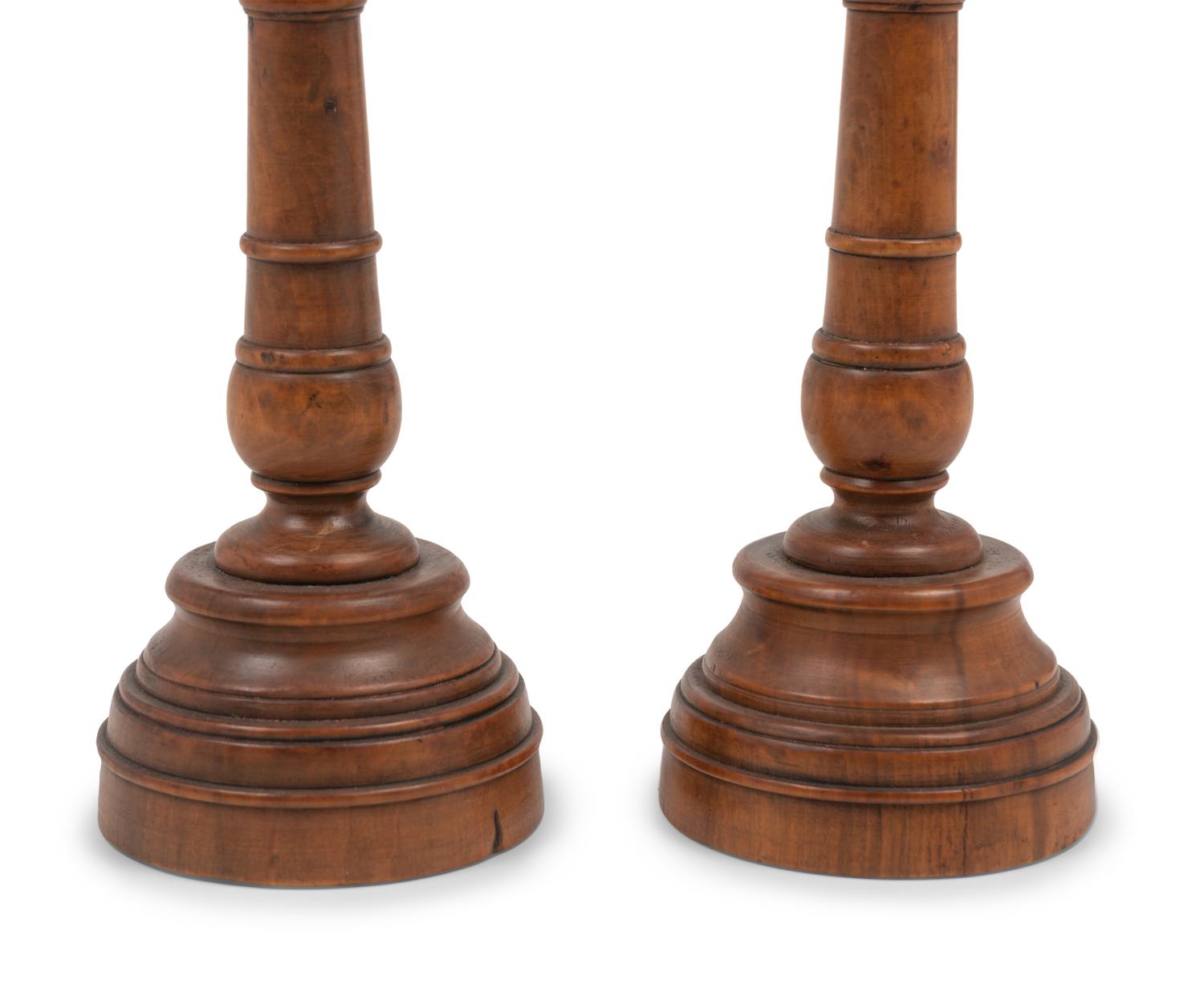 A Pair of French Olivewood "Pique Cierge" Candlesticks