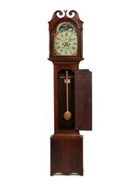 A Federal Carved Cherrywood Tall Case Clock