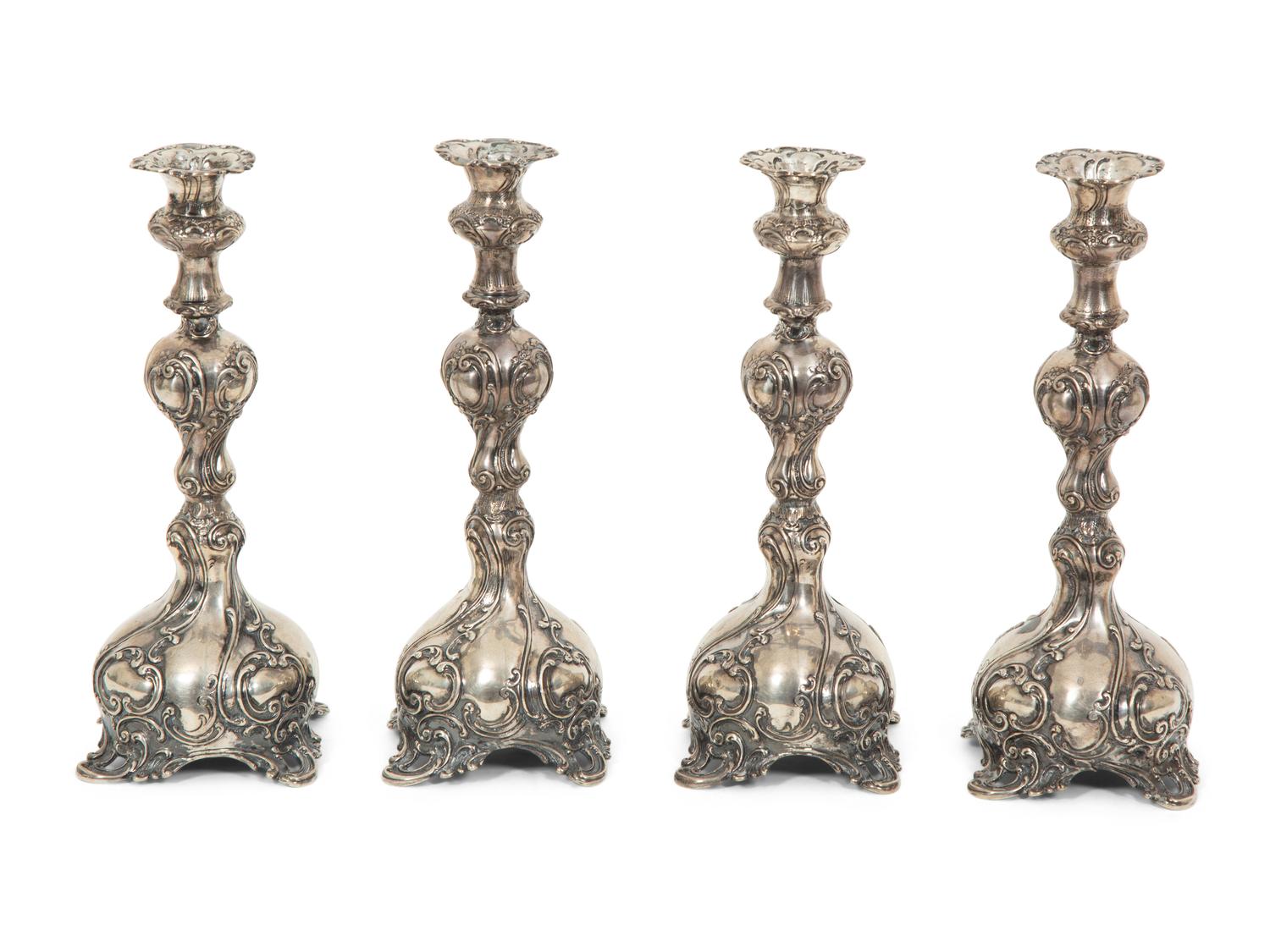 A Set of Four German Silver Candlesticks