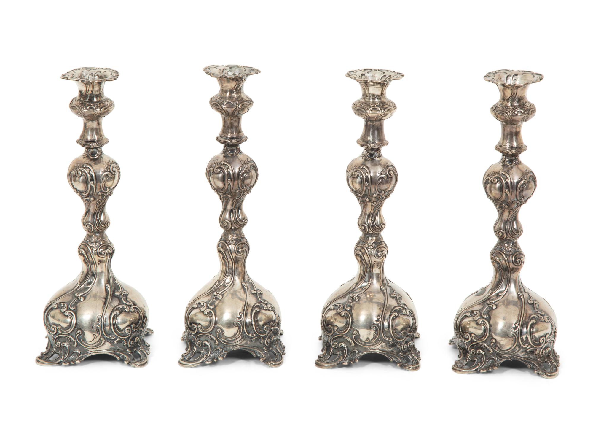 A Set of Four German Silver Candlesticks