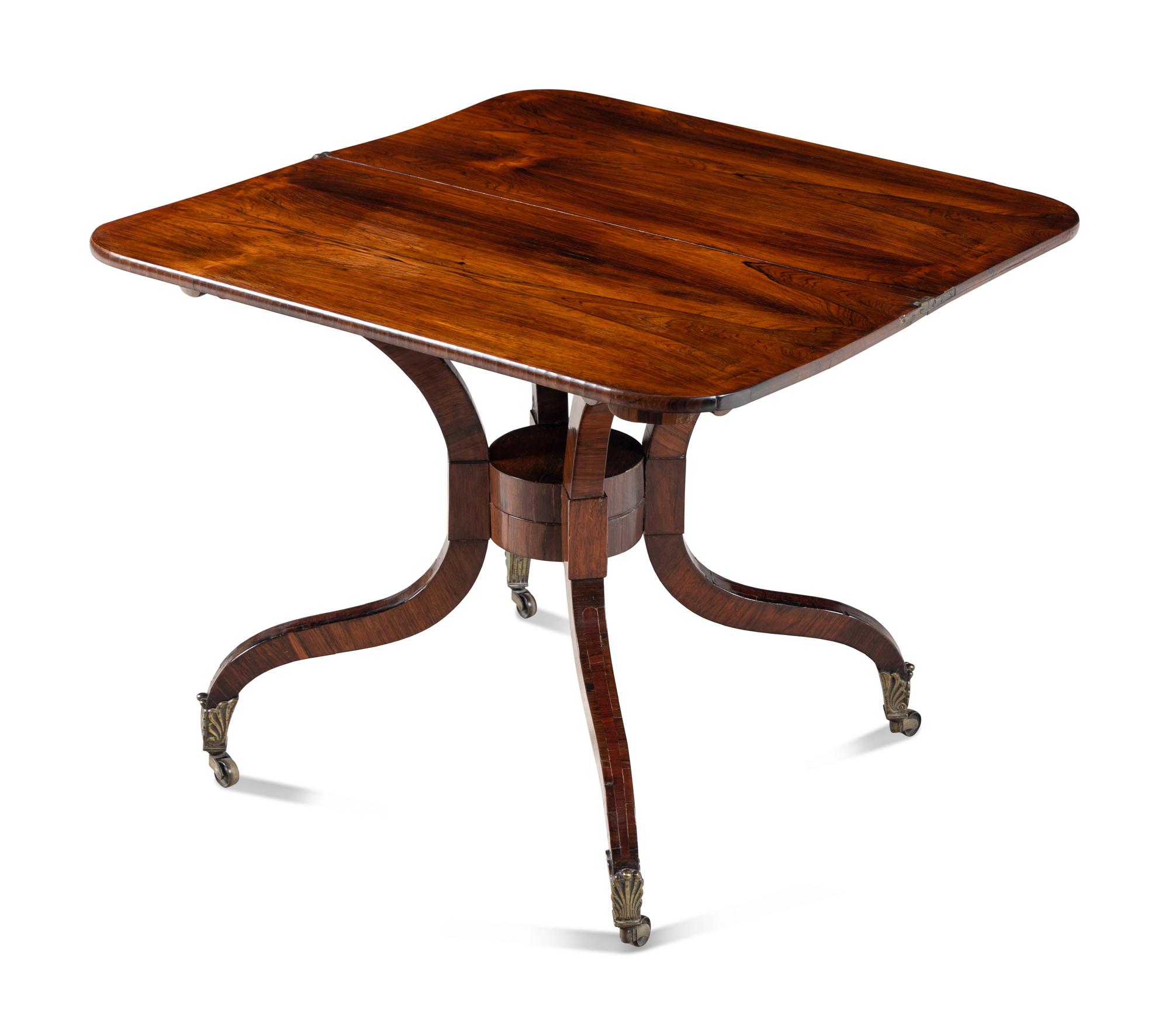 A Regency Rosewood and Mahogany Flip-Top Table