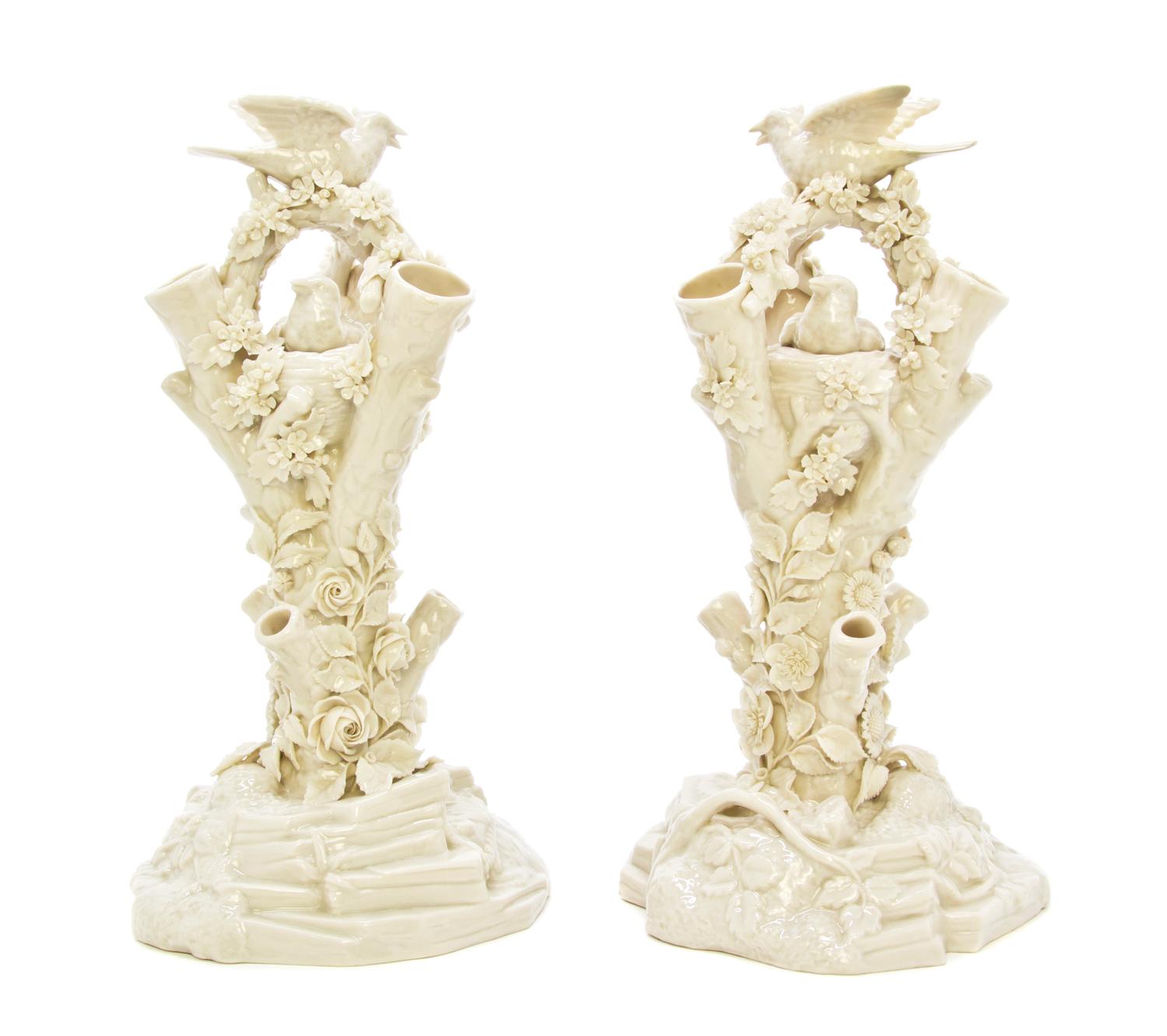 A Pair of Belleek Bird Stump Vases, Height 12 5/8 inches.