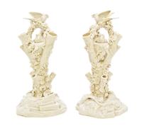 A Pair of Belleek Bird Stump Vases, Height 12 5/8 inches.