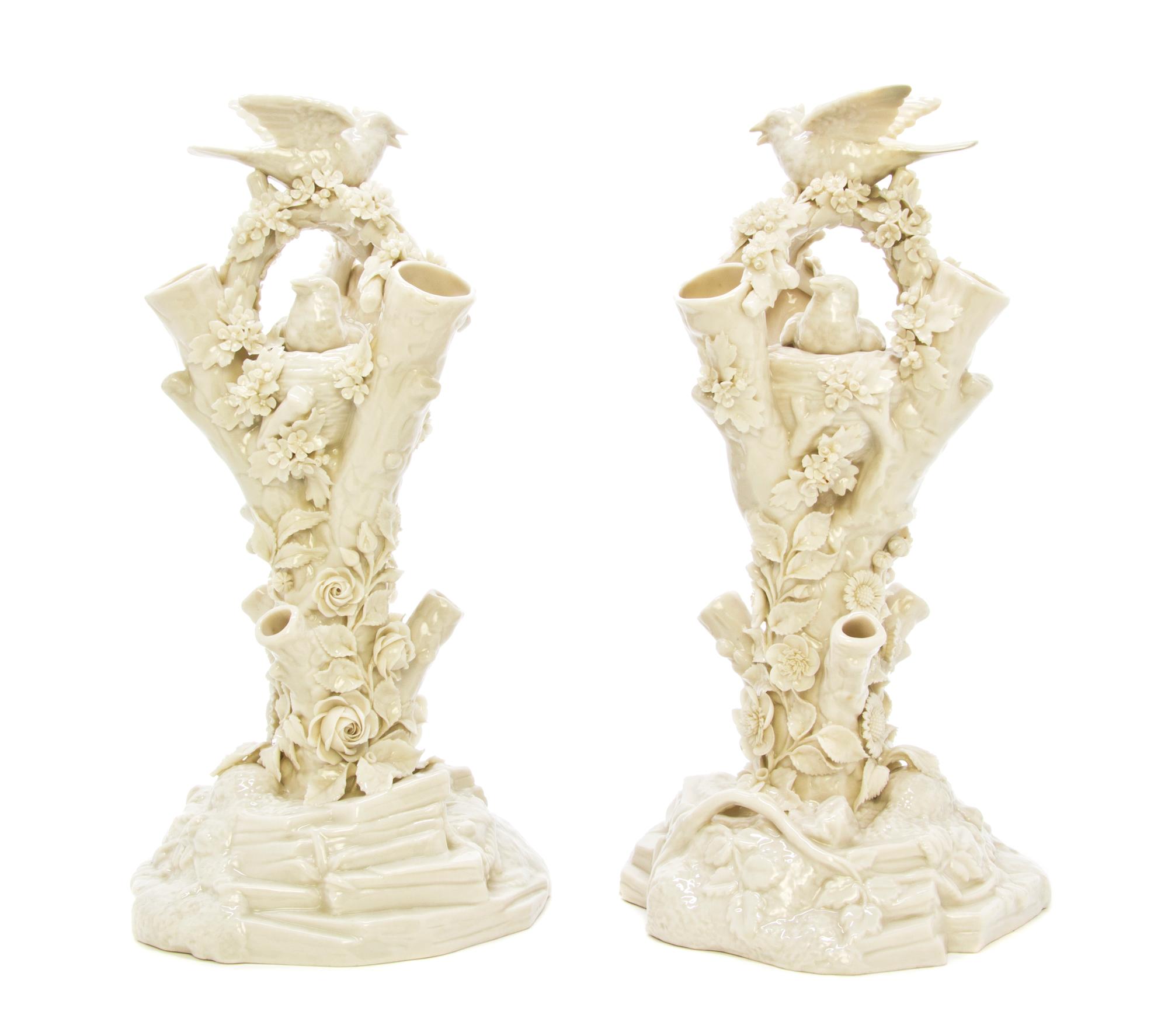 A Pair of Belleek Bird Stump Vases, Height 12 5/8 inches.