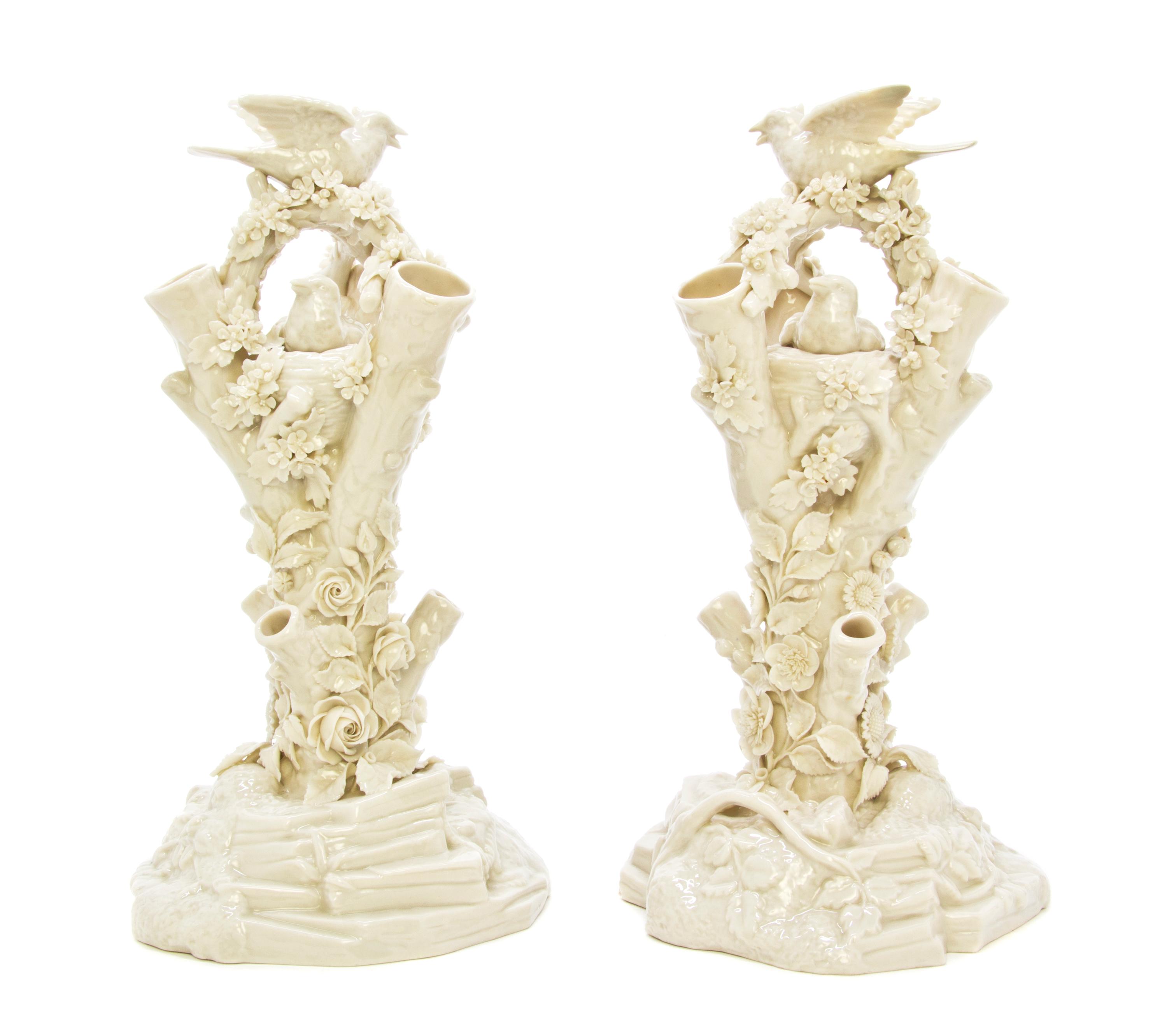 A Pair of Belleek Bird Stump Vases, Height 12 5/8 inches.