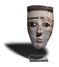 An Egyptian Painted Wood Mummy Mask