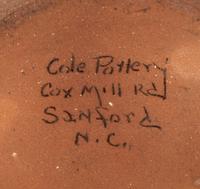 A Cole Pottery Glazed Stoneware Face Jug