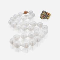A Silver and Gold Men's Ring and Baroque Pearl Necklace