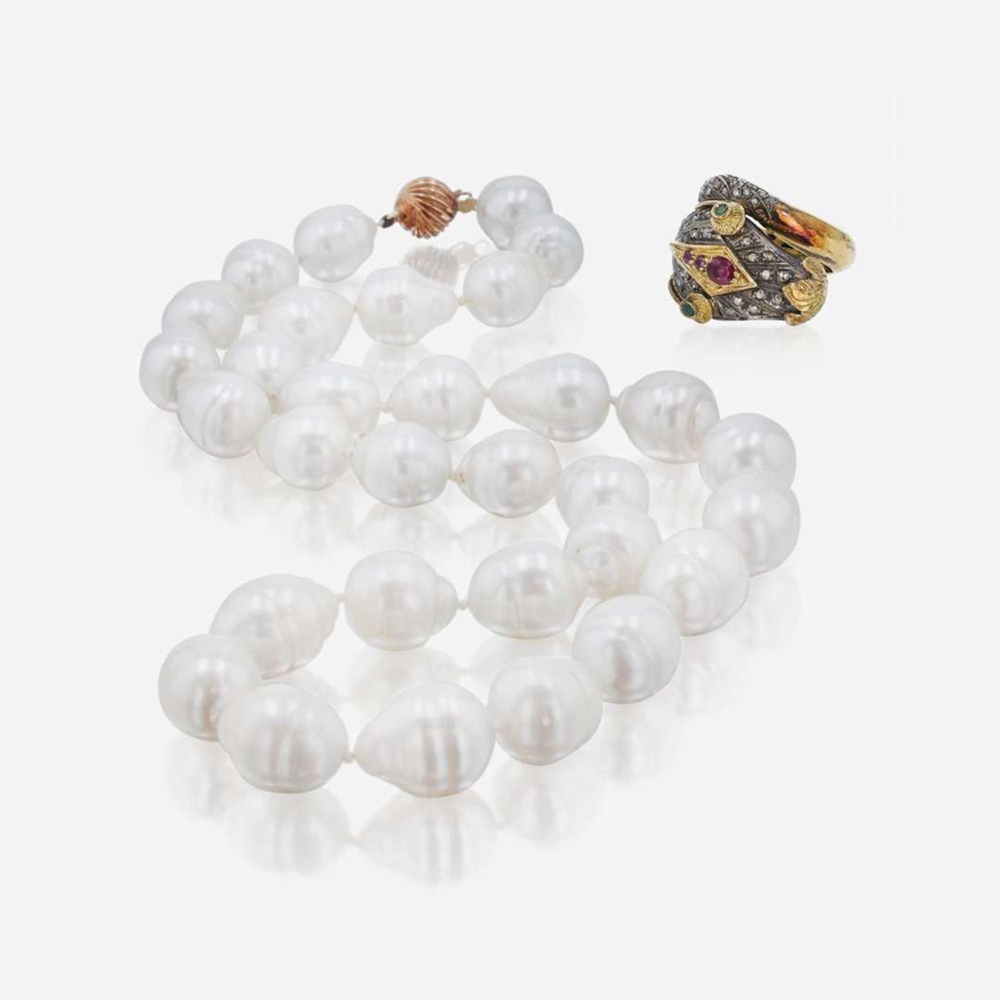A Silver and Gold Men's Ring and Baroque Pearl Necklace