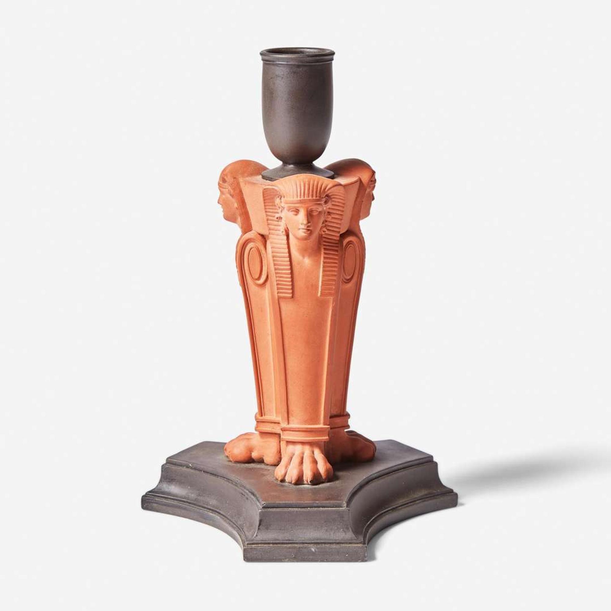 A Wedgwood Black Basalt and Rosso Antico Egyptian Revival Sphinx Monopodia Candleholder UK, early 19th century