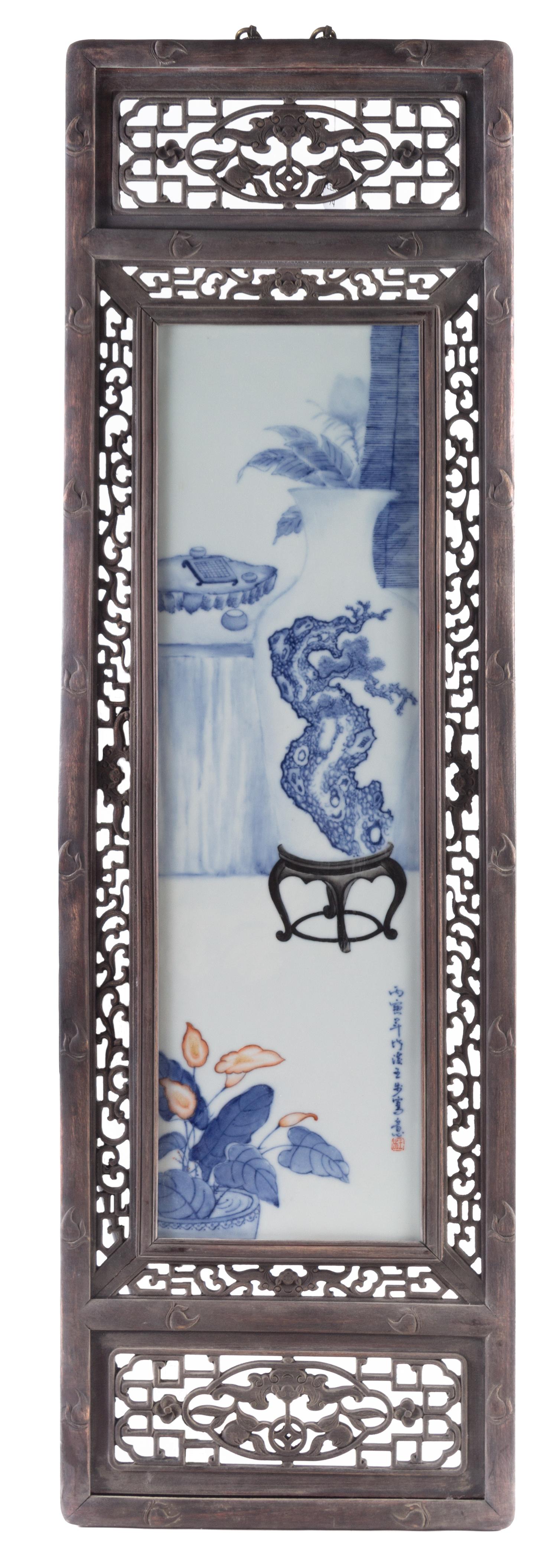 A Set of Four Blue and White Porcelain Plaques Height of each panel 28 3/4 x width 8 1/4 inches.