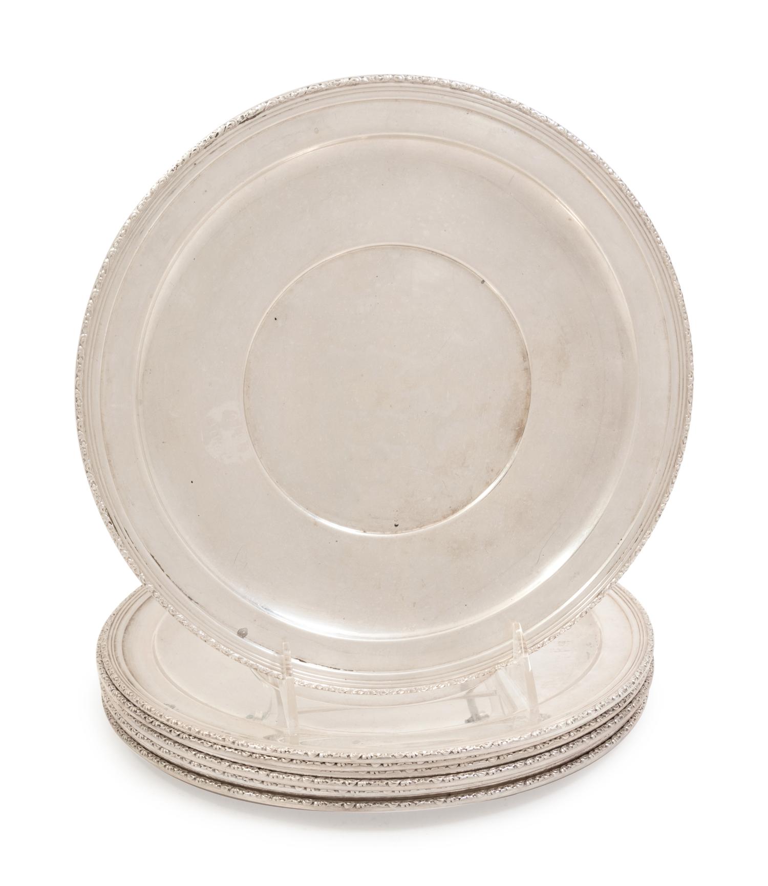 A Set of Eight American Silver Dinner Plates