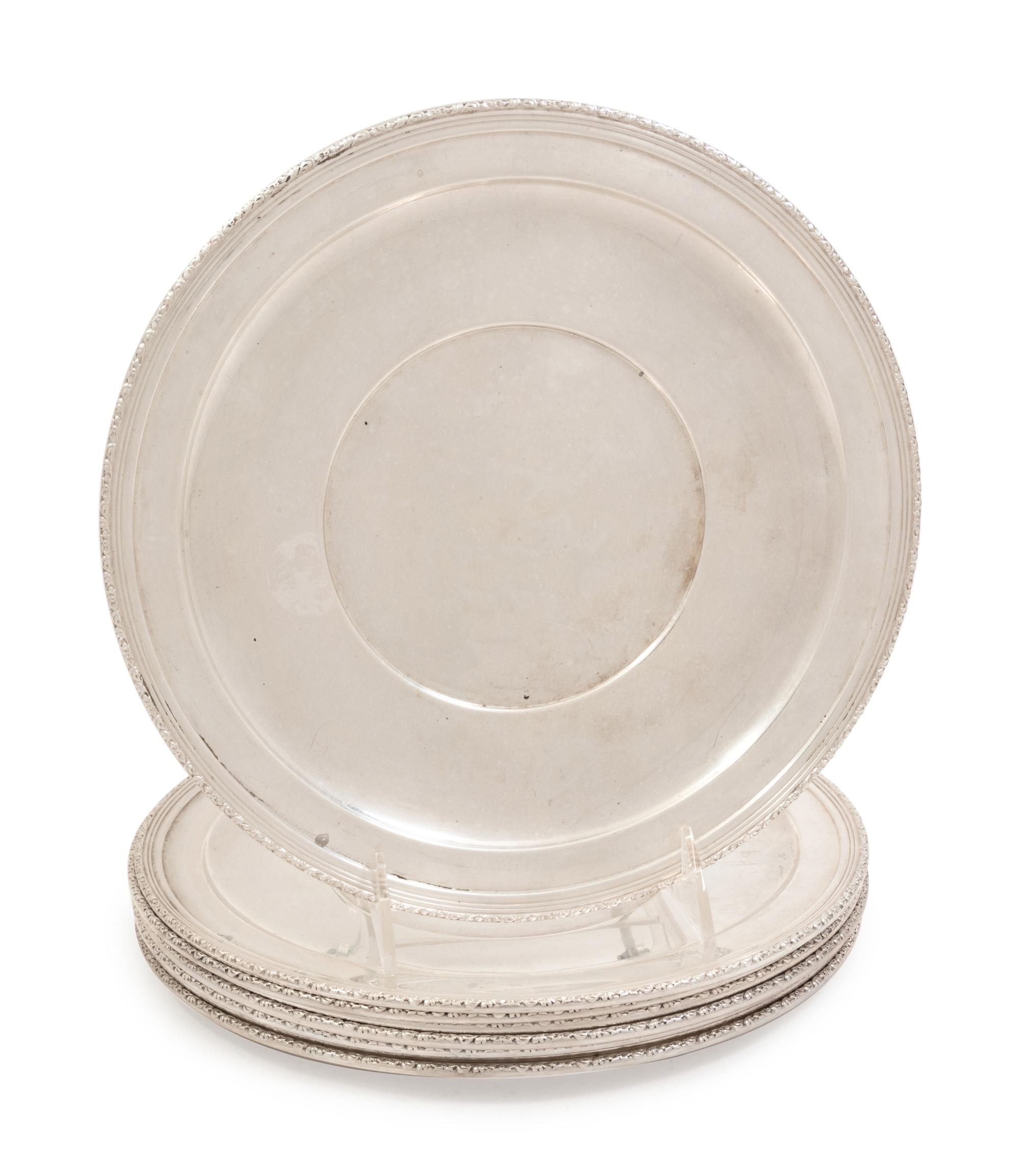 A Set of Eight American Silver Dinner Plates