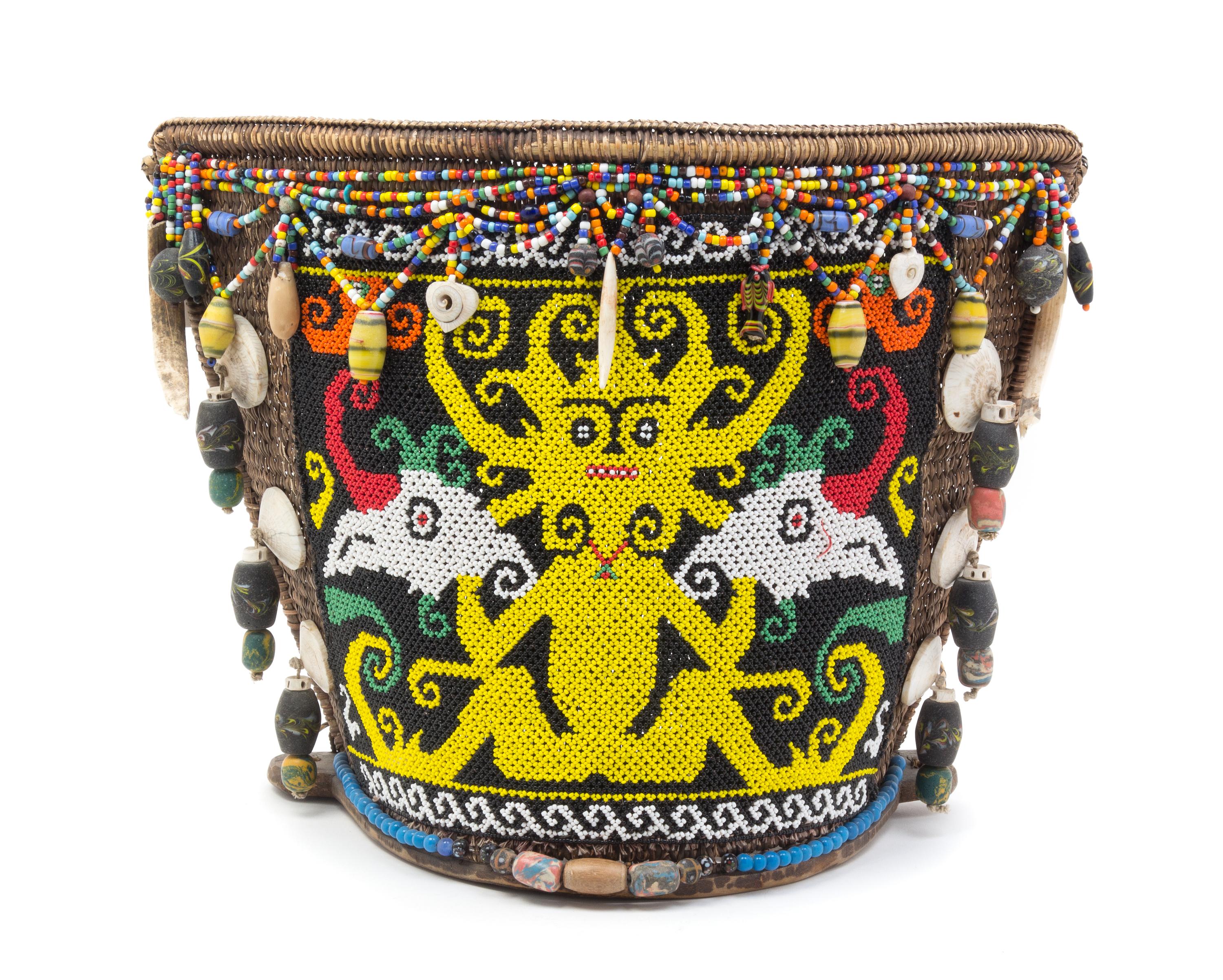 An Indonesian Beaded Baby Carrier, Dayak Width 17 inches. — 20TH CENTURY, KALIMANTAN