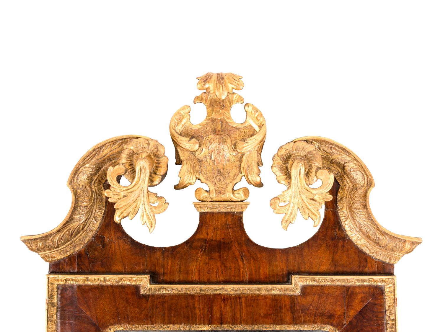 A George II Parcel Gilt Walnut Mirror