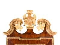 A George II Parcel Gilt Walnut Mirror