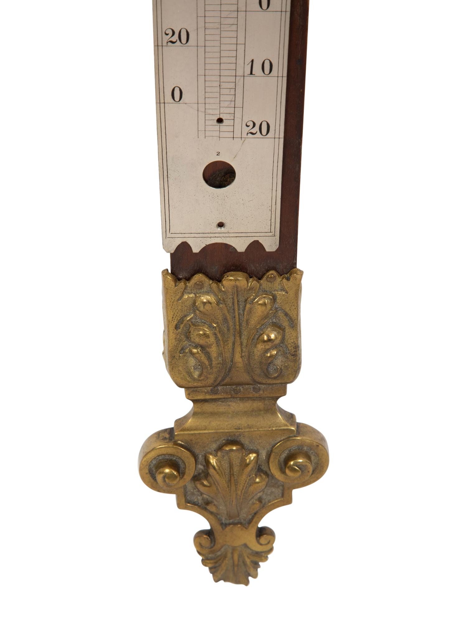 A Continental Carved Wood and Gilt Bronze Thermometer