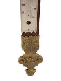 A Continental Carved Wood and Gilt Bronze Thermometer