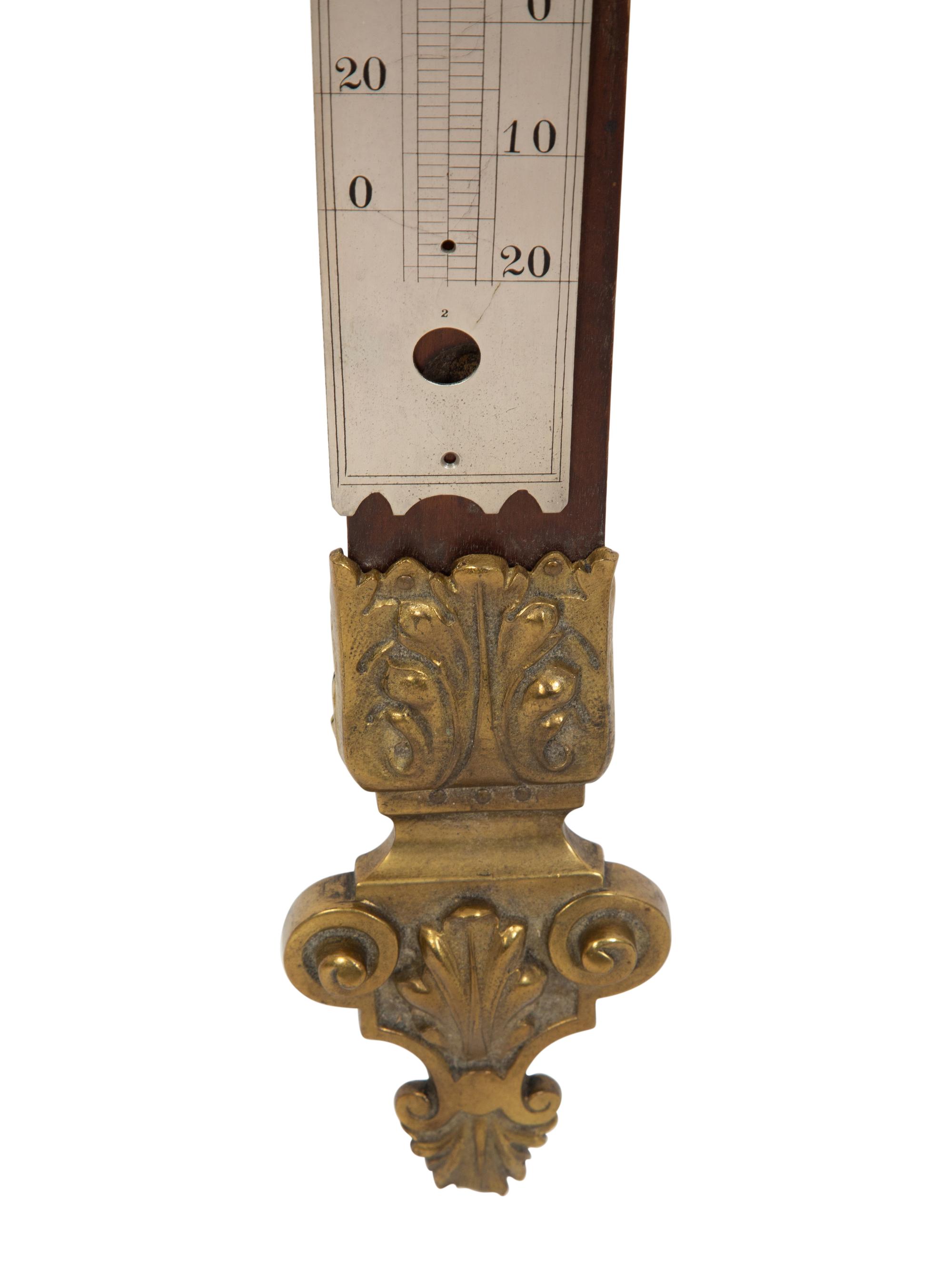A Continental Carved Wood and Gilt Bronze Thermometer