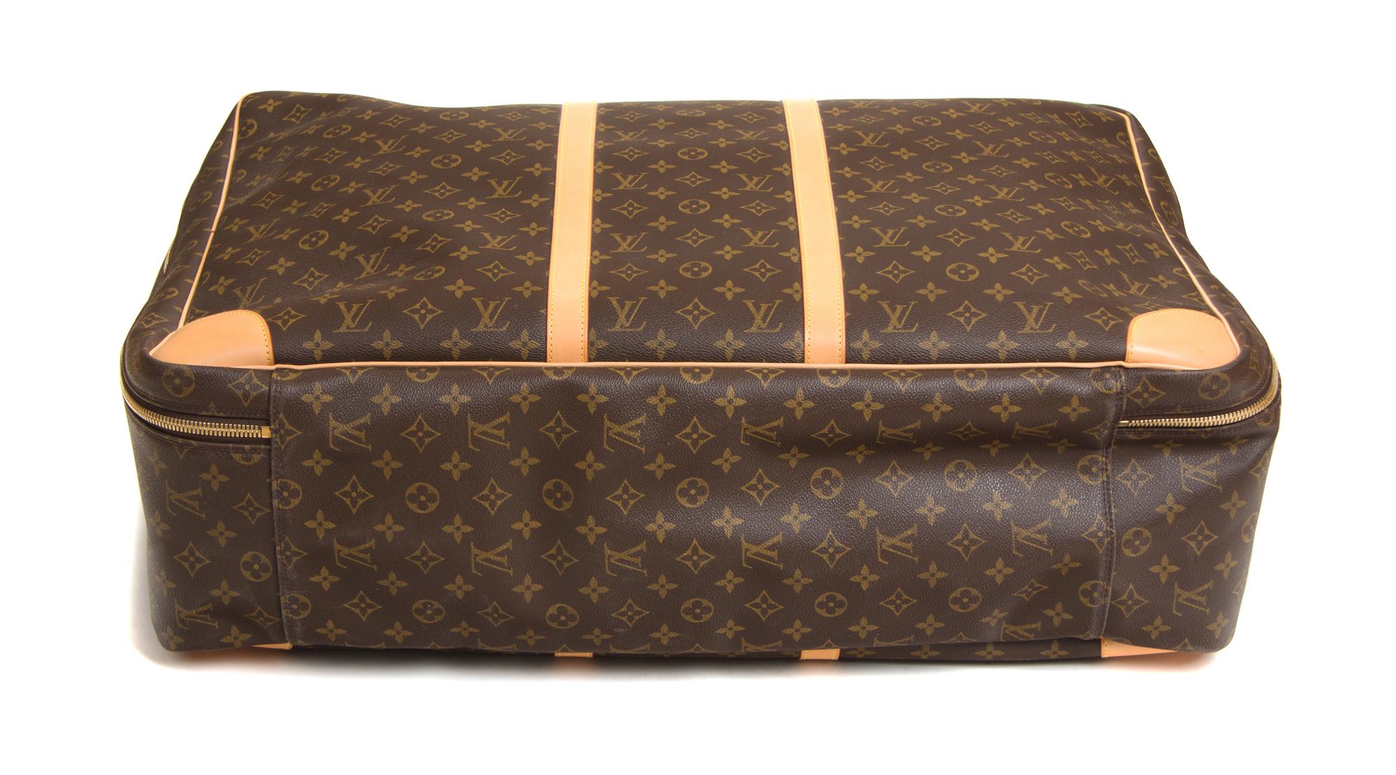 A Louis Vuitton Monogram Canvas Sirius Soft Sided Suitcase, 18"H x 25.5"W x 8.5"D; Handle drop: 5.5".