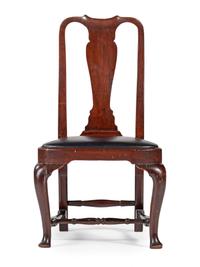 A Queen Anne Carved Walnut Compass-Seat Stretcher-Base Side Chair