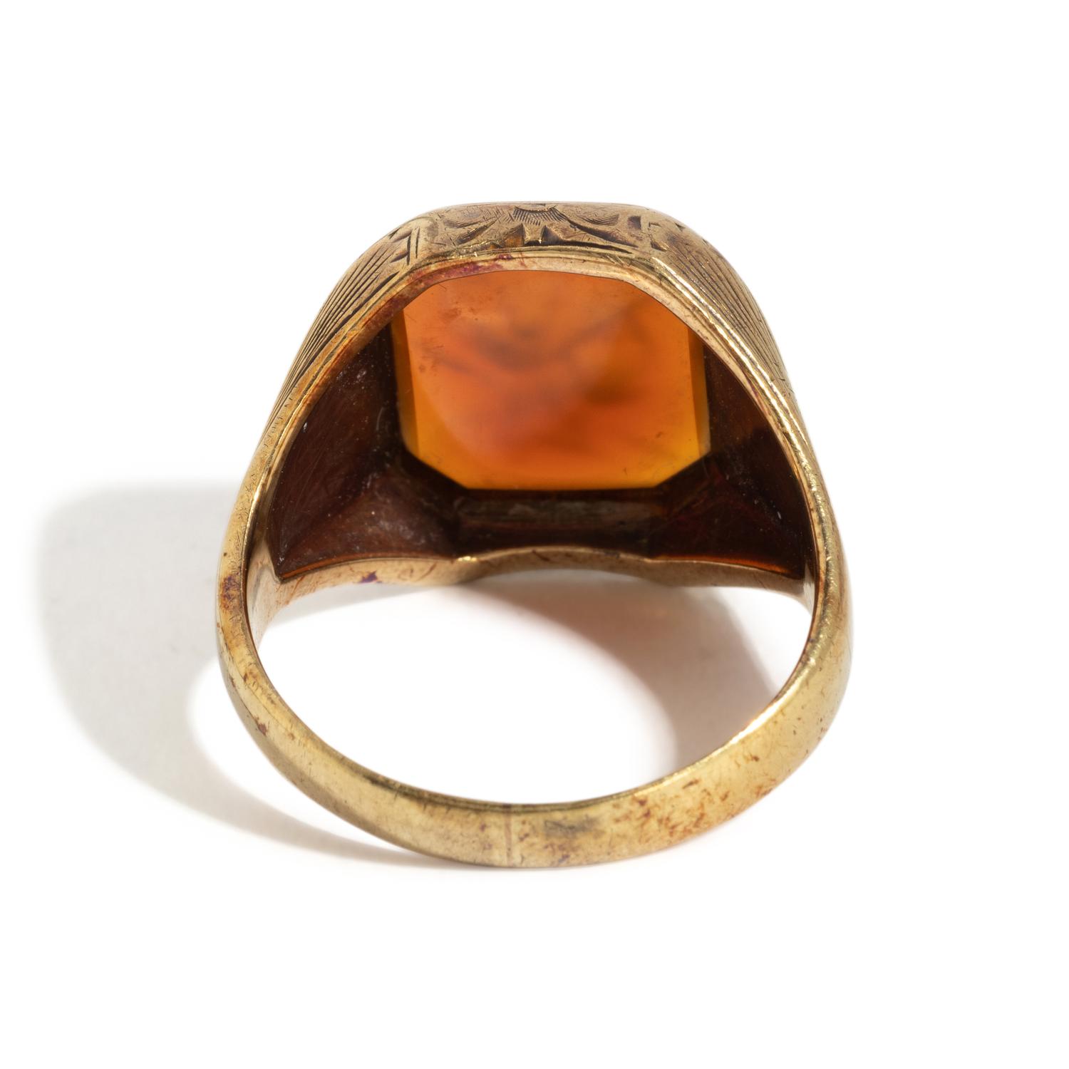 A Neoclassical Gold and Carnelian Finger Ring with the Bust of a Deity