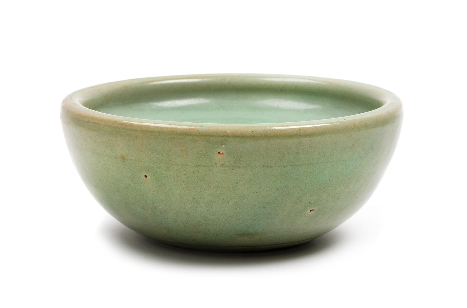 A Chinese Longquan Celadon Glazed Porcelain Warming Bowl Diameter 8 1/4 inches. — MING DYNASTY, 16TH/17TH CENTURY