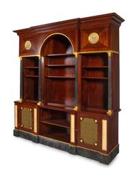 APPROVED FOR DONATION A Neoclassical Style Gilt Metal Mounted Mahogany and Faux Marble Illuminated Bookcase