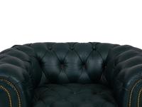 A Chesterfield Style Button-Tufted Leather Armchair