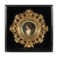 A Vienna Porcelain Cabinet Plate in a Florentine Giltwood Frame