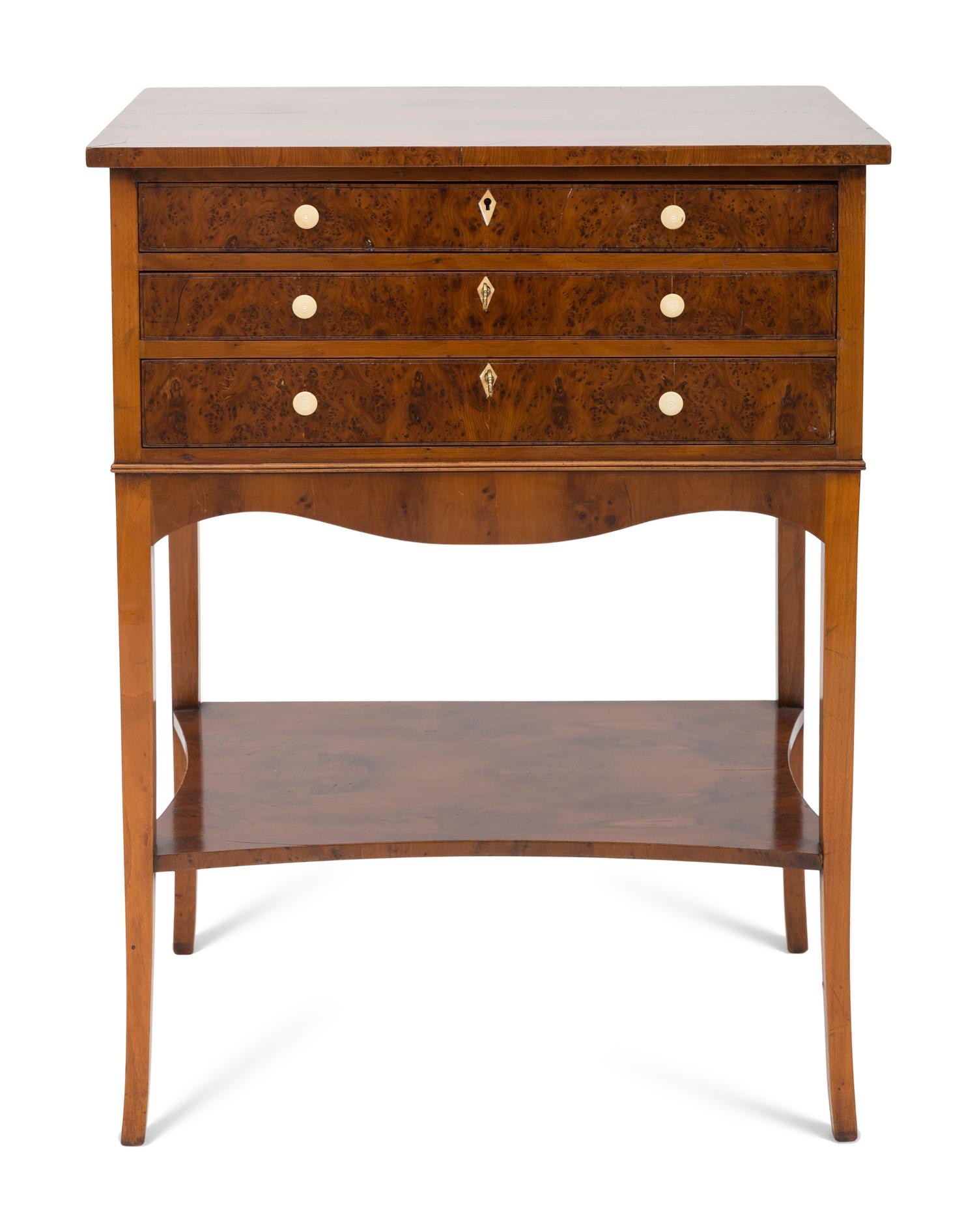 A Regency Style Titchmarsh and Goodwin Burl Walnut Work Table