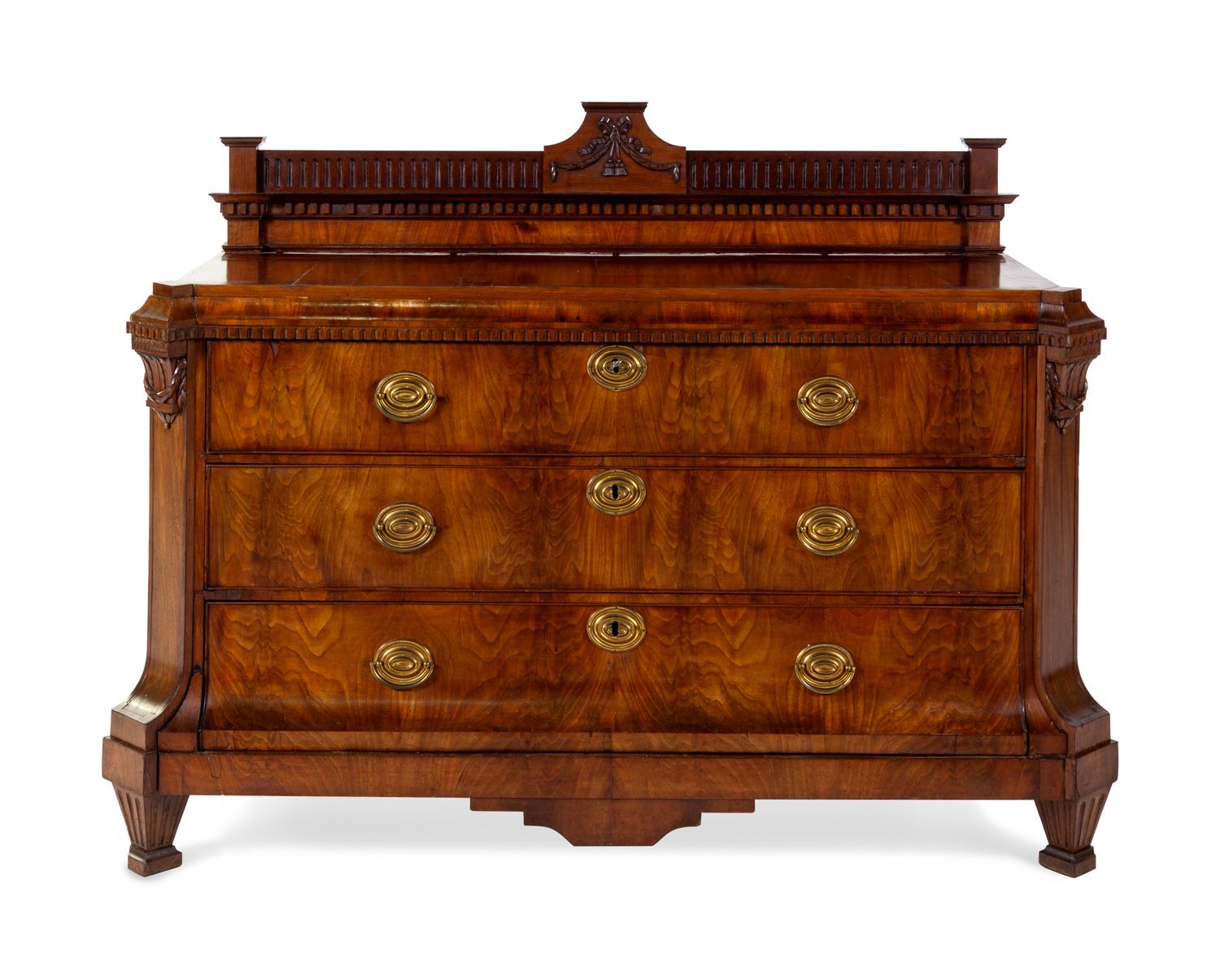 An English Figured Walnut Veneered Chest of Drawers