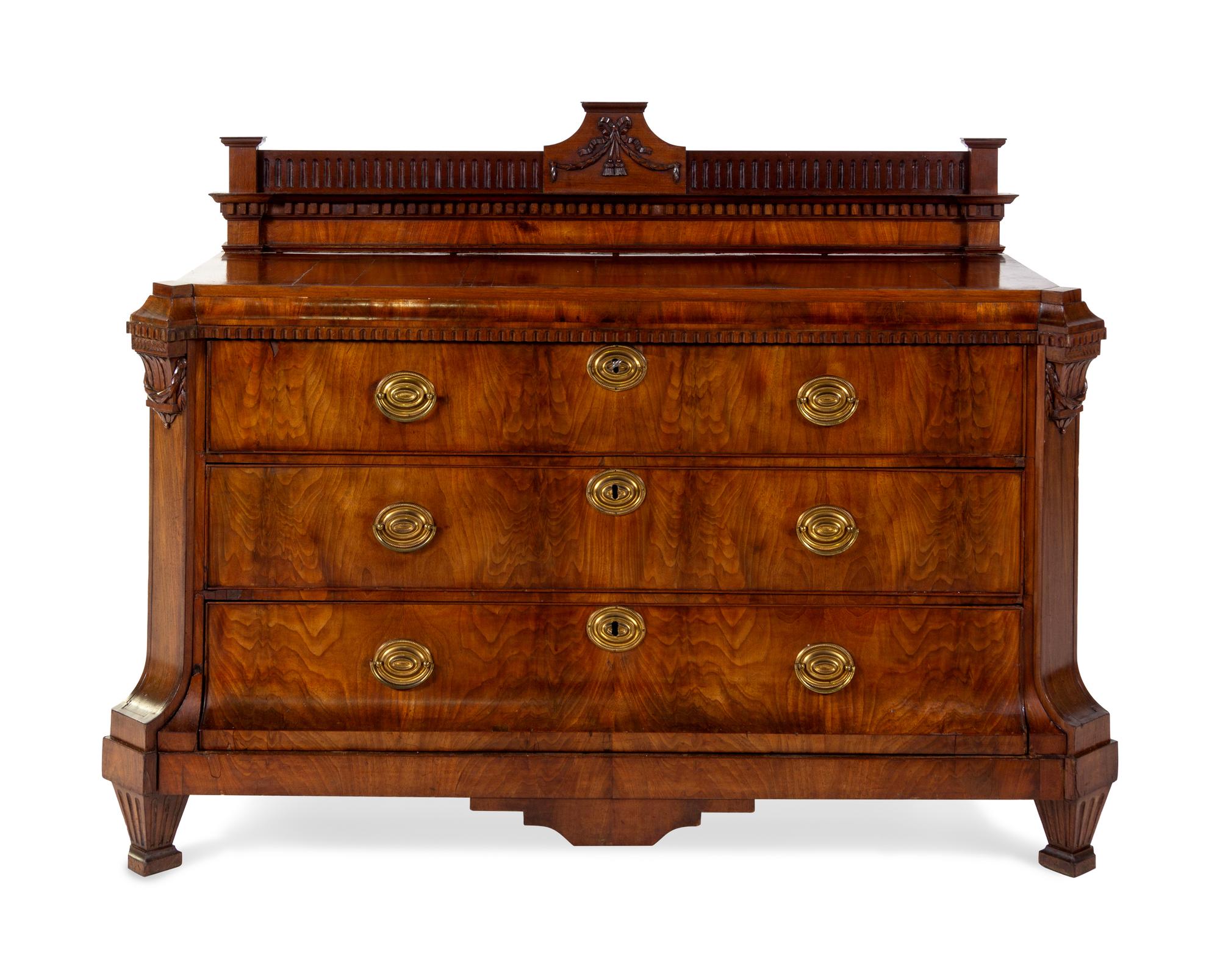 An English Figured Walnut Veneered Chest of Drawers