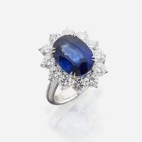A sapphire, diamond and gold ring
