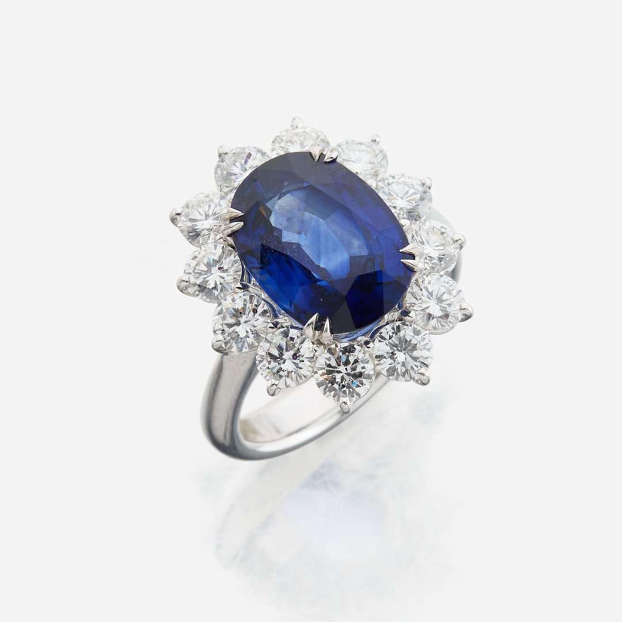 A sapphire, diamond and gold ring