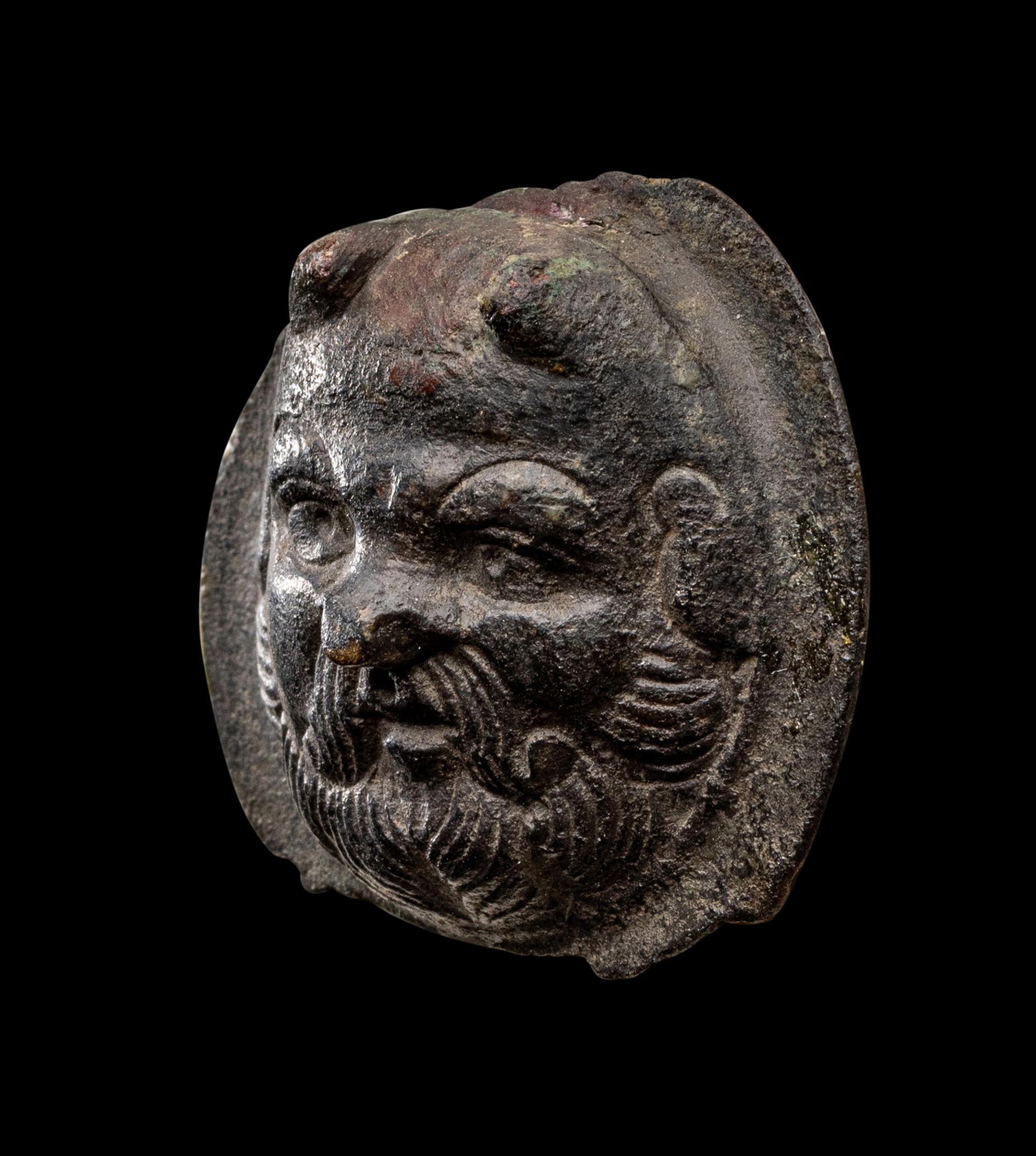 A Roman Bronze Boss with the Head of a Satyr