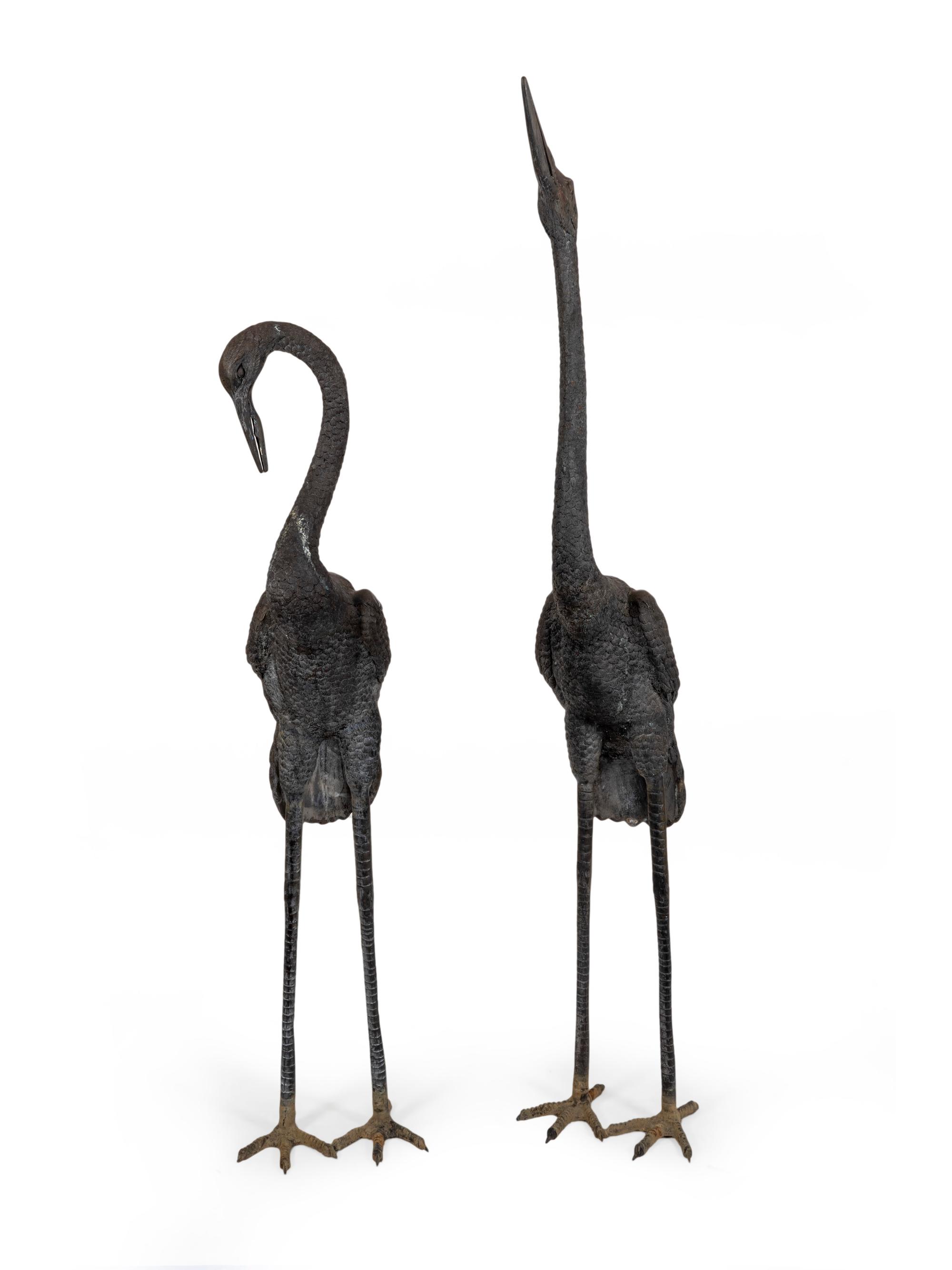 A Pair of Bronze Herons — 20TH CENTURY