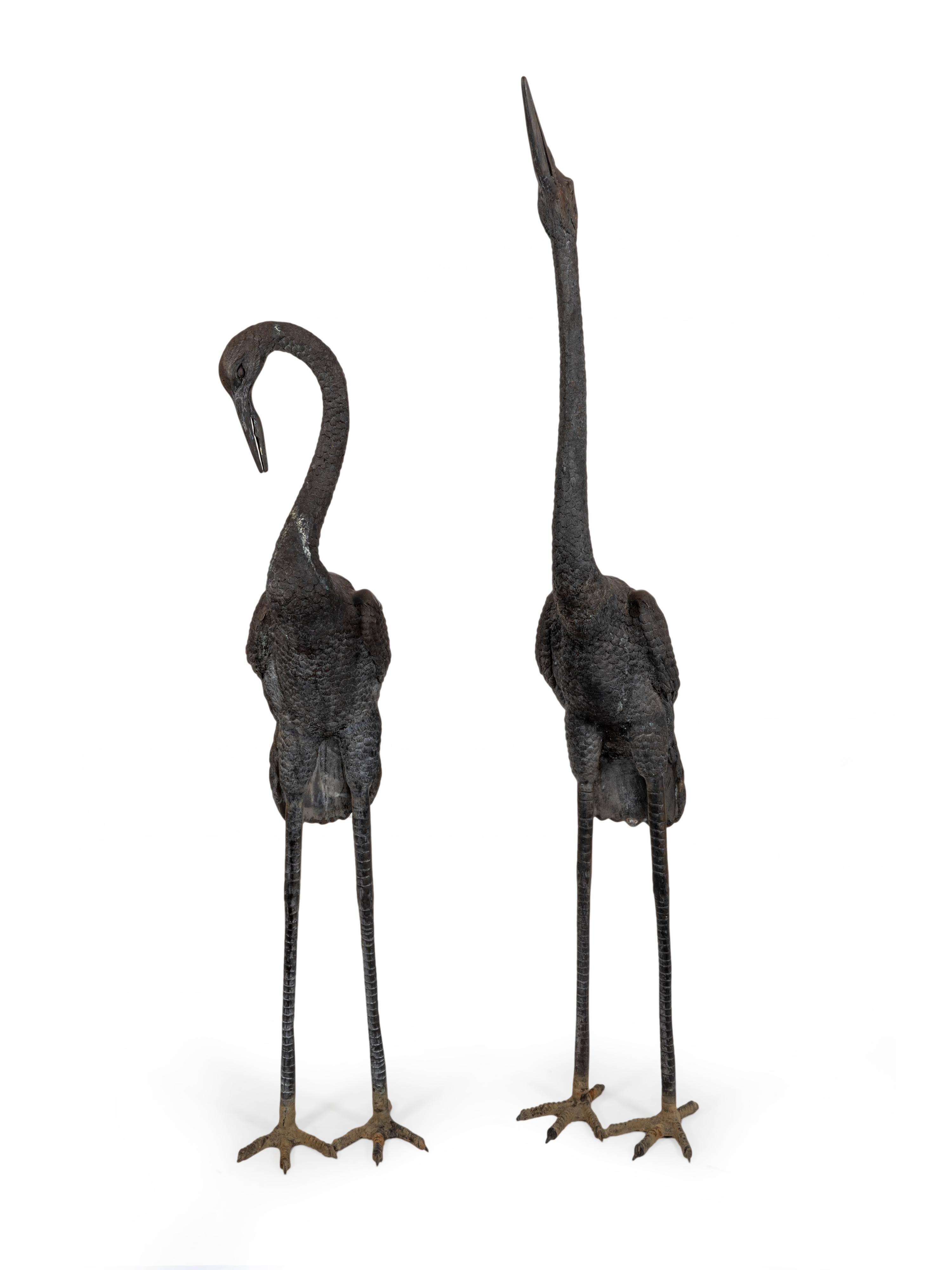 A Pair of Bronze Herons — 20TH CENTURY