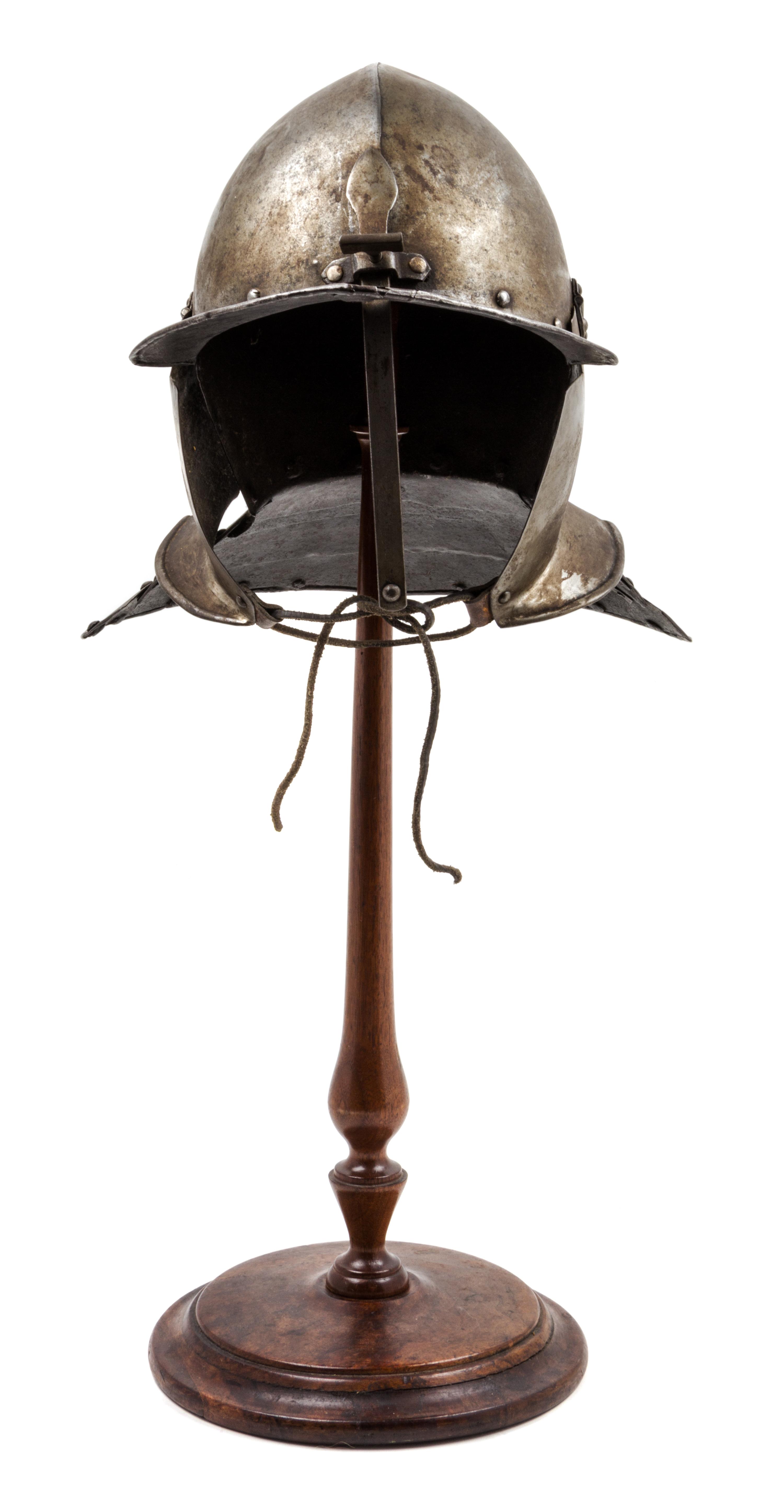 A Cromwellian Lobster Tail Helmet Height 24 3/4 inches. — 17TH CENTURY