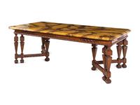 A Renaissance Revival Style Carved Walnut Faux Marble-Top Dining Table