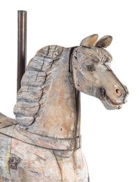 A Carved Pine Horse Form Carousel Figure